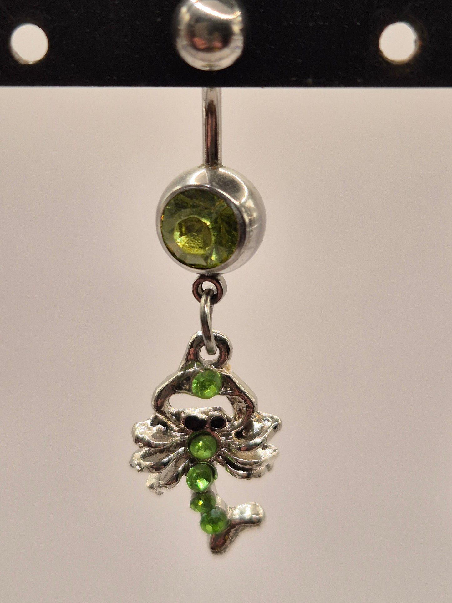 navel piercing schorpioen