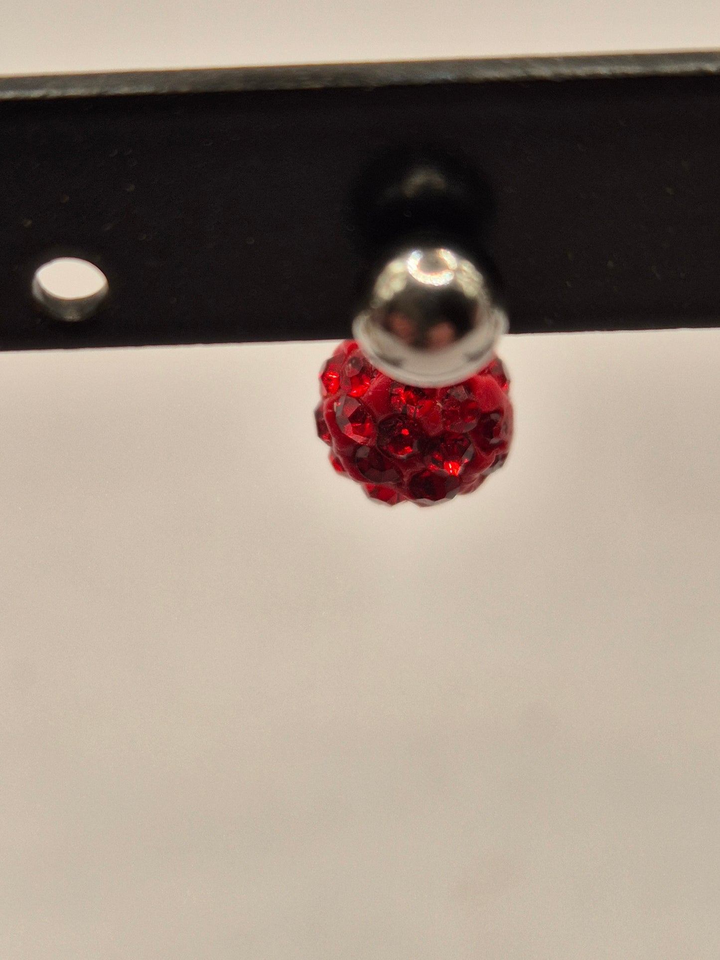 navelpiercing rood