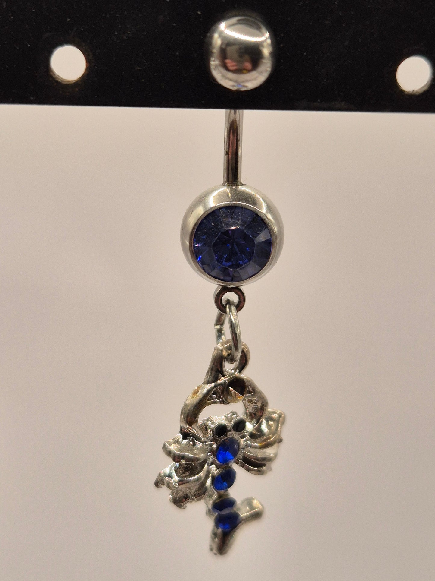 navel piercing schorpioen