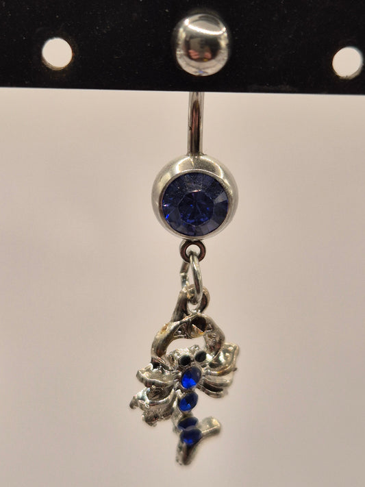 navel piercing schorpioen