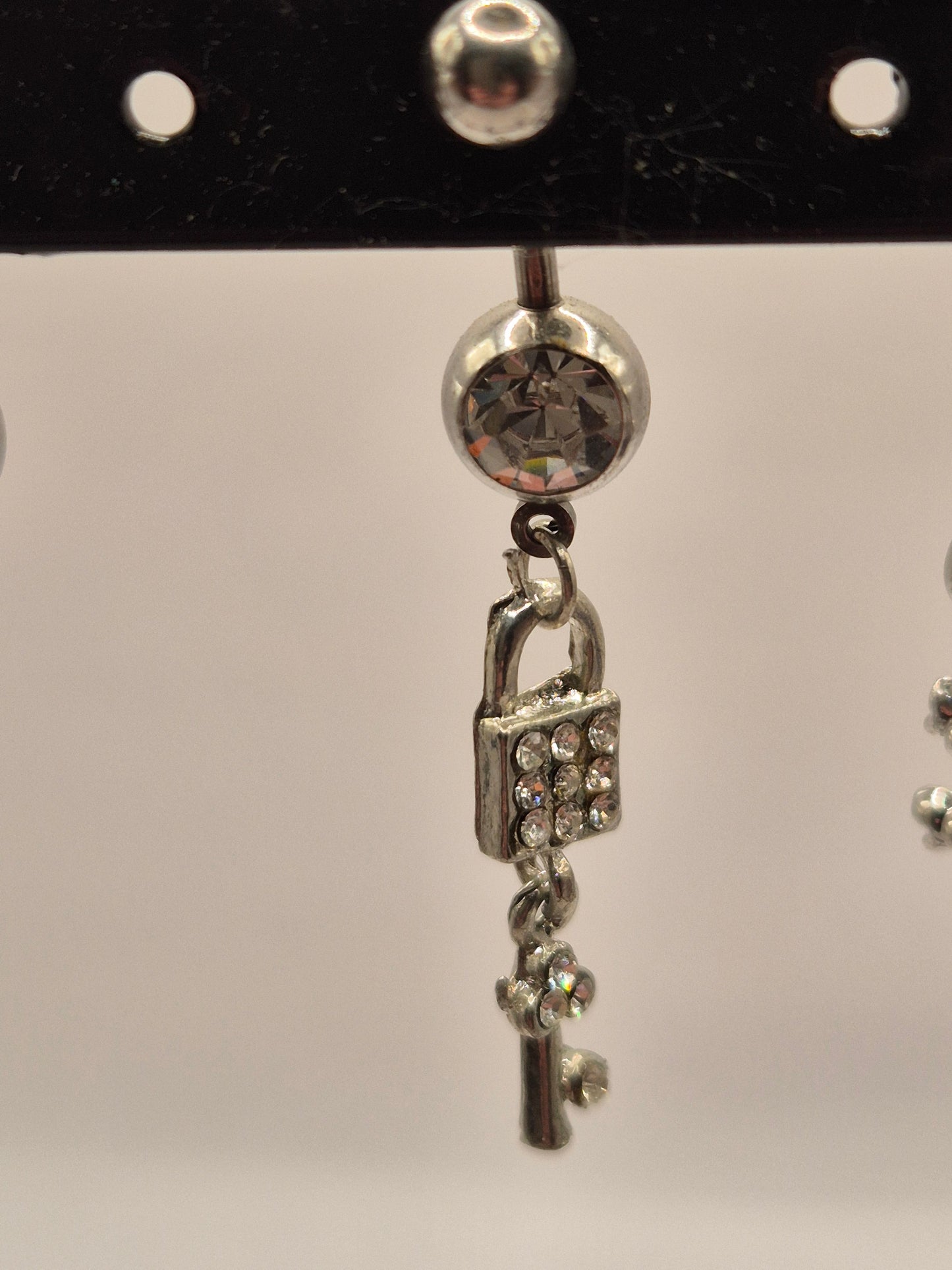 navelpiercing sleutel met slot
